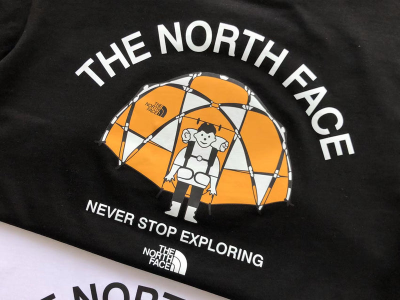 Camiseta The north face never stop exploring preta